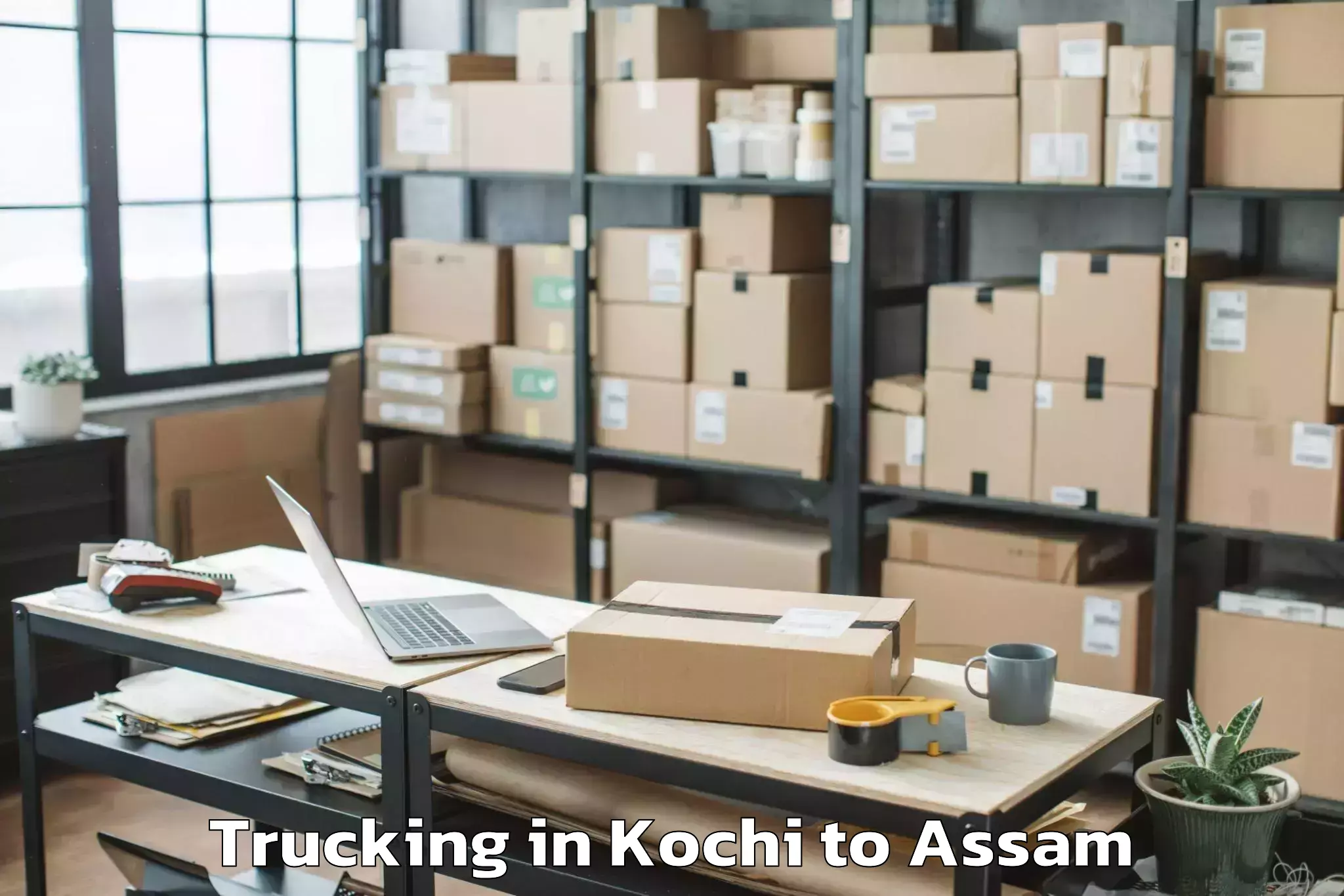 Leading Kochi to Khoirabari Pt Trucking Provider